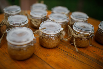 Little bottles with hone stand on the table