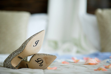 Bride's shoes with lettering 'I do' on the sole