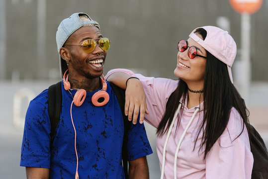 Mixed Race Friends Having Fun In The City.