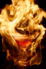 cocktail on fire. fiery cocktail. fire on the bar