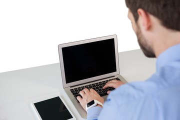 High angle view of businessman using laptop