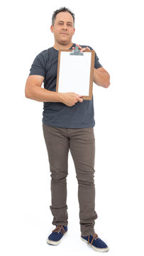 Full body image of man holding a clipboard. He is bald, has overweight and wears dark gray T-shirt..