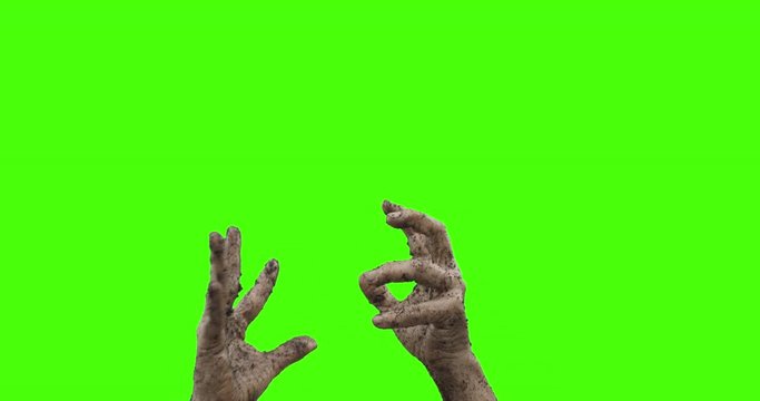 Undead - Hands of a zombie who is rising from the „dead“ and coming out of the grave - sequence - ProRes
