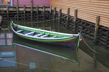 Docked Boat in a small Harbor in Bergen, Norway