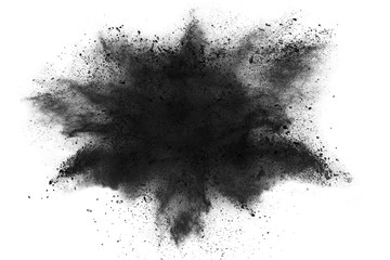 The particles of charcoal splatted on white background.
