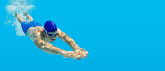 Tauchen Schwimmen Mann Sprung Wasser blau - obrazy, fototapety, plakaty