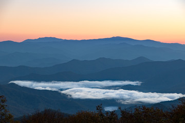 Appalachian mountains with lake and clouds in valley