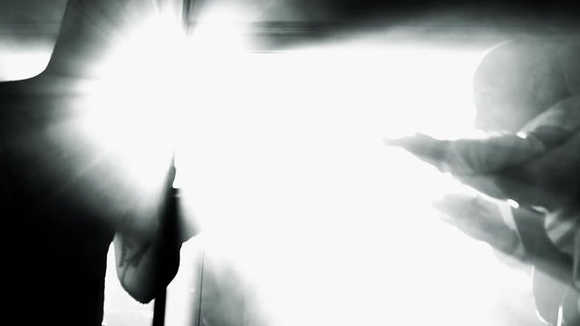 silhouette of boxer training with coach slow motion