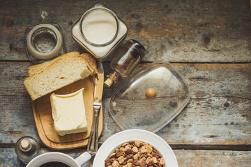 variety on the morning table - flakes, coffee, bread and butter