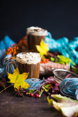 Autumnal concept with yellow leaves and coffee