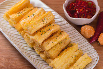Deep fried cassava root. Brazilian food mandioca frita.