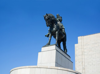 Obraz premium National memorial on Vitkov hill, Zizkov, Prague, Czech Republic / Czechia - Equestrian statue of Jan Zizka, legend, famous hero and medieval warrior. Bronze sculpture of rider and horse on pedestal 