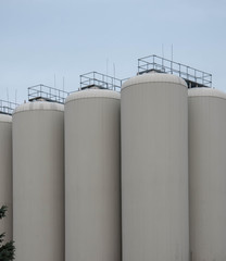 Production. Industrial buildings in the blue sky
