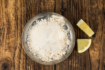Lemon powder (fresh) as detailed close-up shot, selective focus)