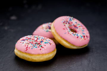 Pink glazed Donuts (close-up shot)