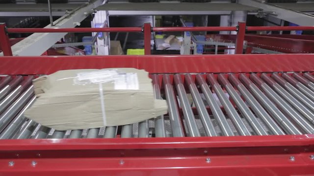 Boxes at Conveyor in Distribution Warehouse
