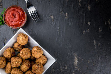 Meatballs (fresh made) as detailed close-up shot, selective focus)