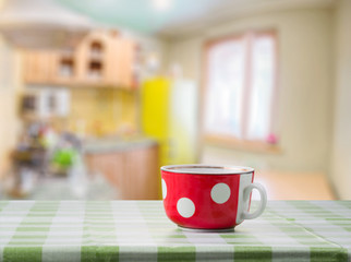 Red cup on the kitchen table