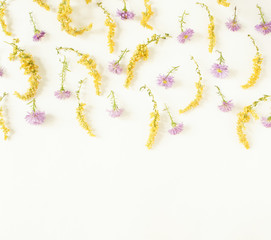 Floral pattern on white background. Flat lay, top view. Pattern of flowers.