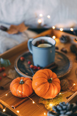 Autumn composition. Hot tea and pumpkin