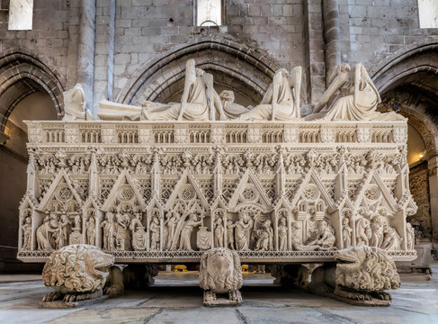 Medieval tomb of King Pedro I of Portugal, decorated with reliefs showing scenes from Saint Bartholomew's life, located in the 13th century Alcobaca Monastery