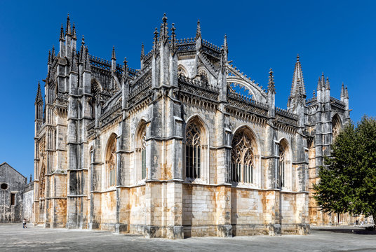 Details of the facade of the 14th century Batalha Monastery in Batalha, Portugal, a prime example of Portuguese Gothic architecture, UNESCO World Heritage site.