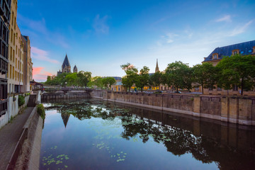 View of Metz with Temple Neuf reflected in the Moselle River, Lorraine, France