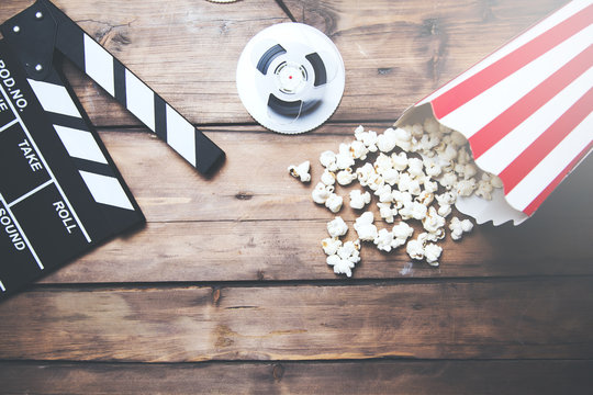 Film camera chalkboard , movie camera and popcorn
