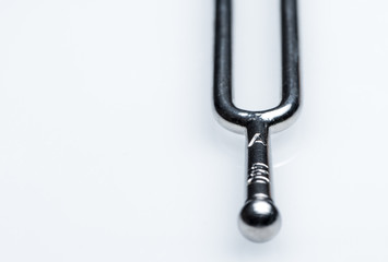 Closeup of a 440 Hz  tuning fork made of steel