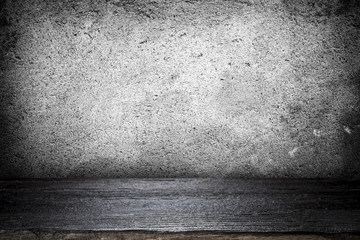 Empty table for present product on grey concrete wall.