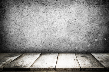 Empty table for present product on grey concrete wall.