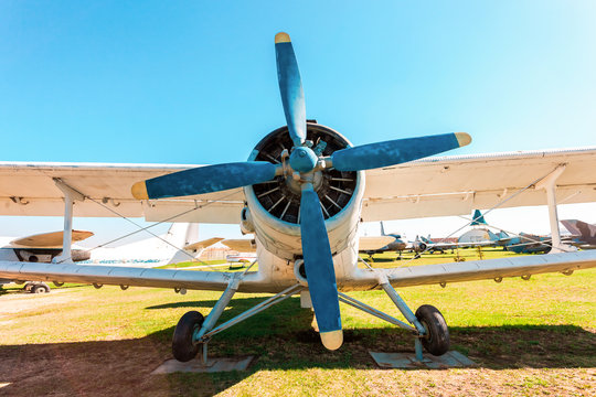 The Antonov An-2 a Soviet mass-produced single-engine biplane at an field aerodrome in summertime