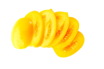 Obraz na płótnie Canvas Sliced fresh yellow tomato on white