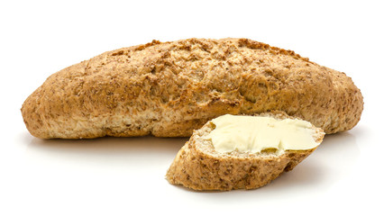 One bagel of wheat bran bread and slice with butter isolated on white background