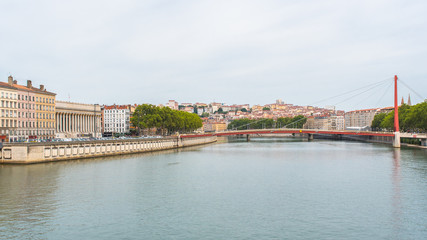 Vieux-Lyon, colorful houses and footbridge in the center, on the river Saone 
