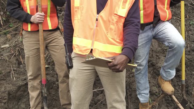 Medium shot of three workers