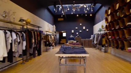 Steadicam shot of a clothing shop during daytime