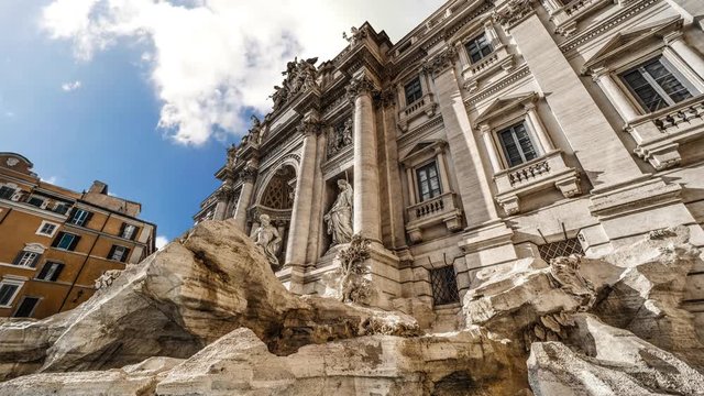 Clouds passing over world famous Fontana di Trevi in Rome, Italy. Time lapse effect
