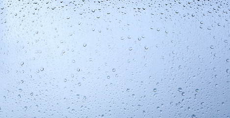 Drops of rain on a window glass.