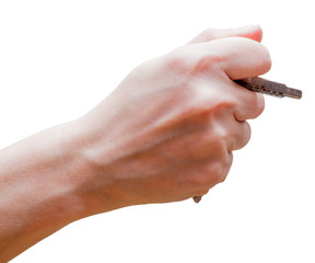Female fist with clipped keys. Using of improvised stuff (door keys) for protection. The blow with such fist will cause more damage. Self-defense concept. Isolated on white background.