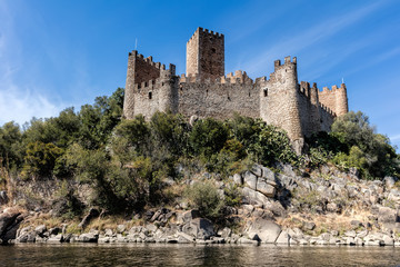 Fototapeta na wymiar Castle of Almourol in Portugal, initiated the 12th century, located on a small islet in the middle of the Tagus River, served as a stronghold used during the Portuguese Reconquista.