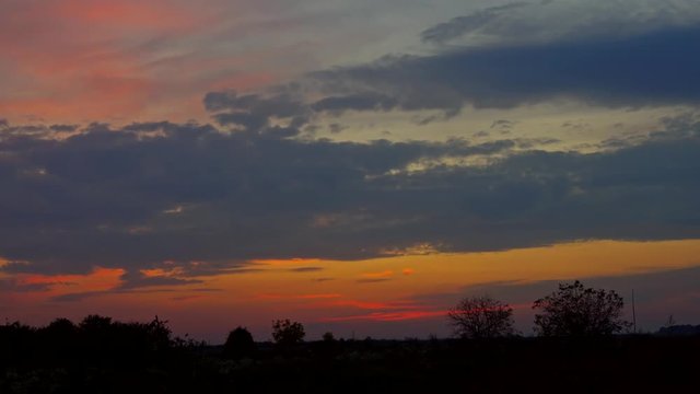 Red purple orange blue pink sunset sky cloud Red purple cloudscape time lapse background