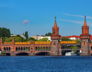 train crossing the Oberbaum bridge Berlin Germany