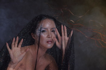Witchcraft Asian woman in scary Witch ghost story look
