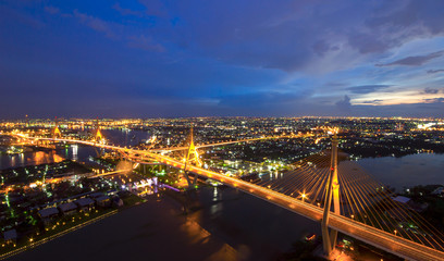 Fototapeta na wymiar Bangkok City - Beautiful sunset view of Bhumibol Bridge in Bangkok , Bridge of transportation for import , export , Bangkok ,Thailand