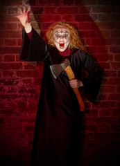 Witch on brick background