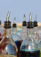 bottles of sugary syrup to prepare drinks and grenades on the be