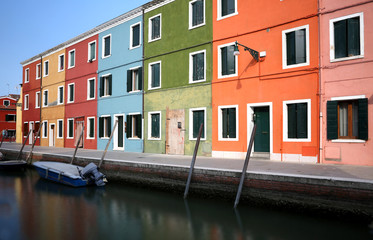 Fototapeta na wymiar canal and the colorful houses of the BURANO island near Venice