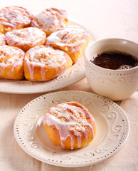 Pumpkin swirl buns with icing