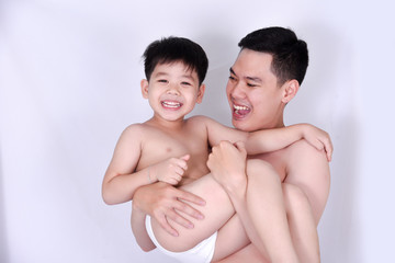 Happy Portrait Of Father And Son playing at white blackgroung.Asia